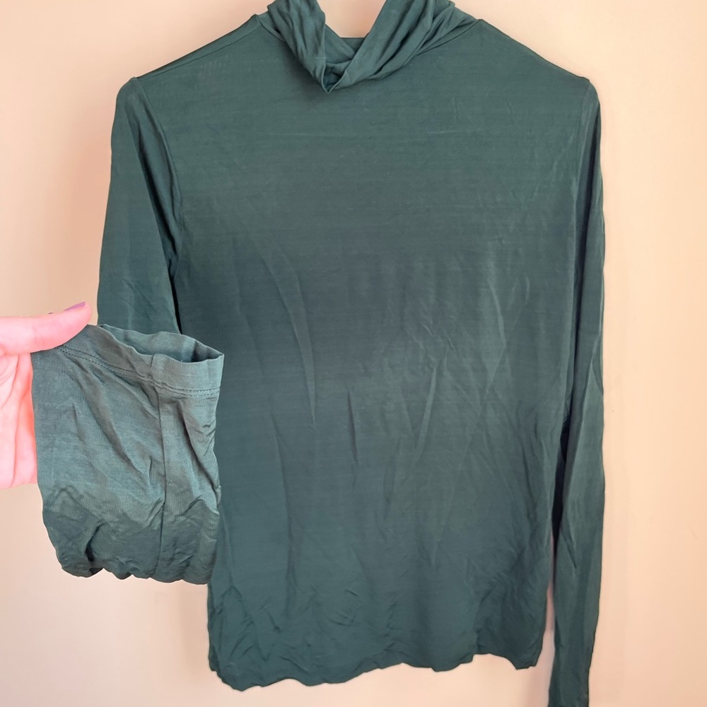 Silky shiny green turtleneck